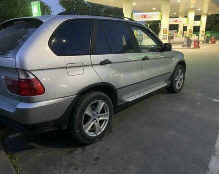 Серый БМВ Х5, объемом двигателя 3 л и пробегом 247 тыс. км за 7800 $, фото 1 на Automoto.ua
