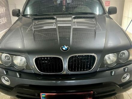 Серый БМВ Х5, объемом двигателя 3 л и пробегом 270 тыс. км за 10500 $, фото 1 на Automoto.ua