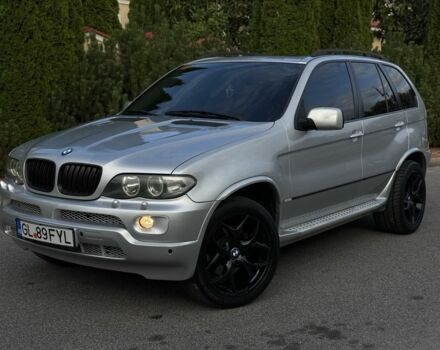 Серый БМВ Х5, объемом двигателя 3 л и пробегом 300 тыс. км за 7500 $, фото 1 на Automoto.ua