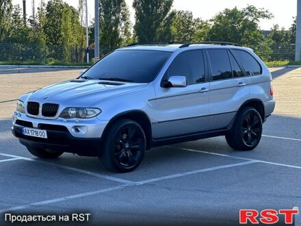Серый БМВ Х5, объемом двигателя 3 л и пробегом 300 тыс. км за 8999 $, фото 1 на Automoto.ua
