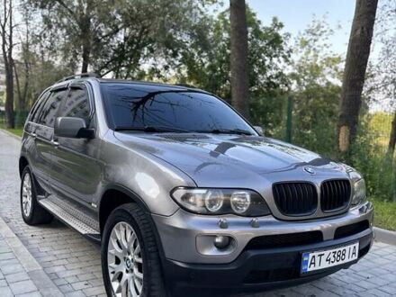 Серый БМВ Х5, объемом двигателя 3 л и пробегом 290 тыс. км за 12350 $, фото 1 на Automoto.ua
