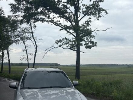 Сірий БМВ Х5, об'ємом двигуна 3 л та пробігом 310 тис. км за 14700 $, фото 1 на Automoto.ua