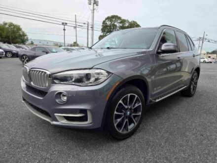 Серый БМВ Х5, объемом двигателя 3 л и пробегом 72 тыс. км за 19700 $, фото 1 на Automoto.ua