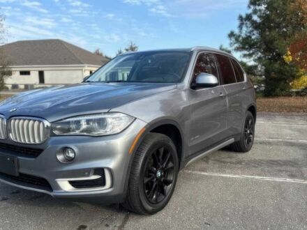 Серый БМВ Х5, объемом двигателя 3 л и пробегом 58 тыс. км за 25000 $, фото 1 на Automoto.ua