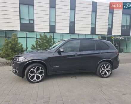 Серый БМВ Х5, объемом двигателя 2 л и пробегом 165 тыс. км за 35999 $, фото 1 на Automoto.ua