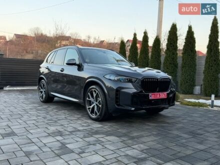 Серый БМВ Х5, объемом двигателя 3 л и пробегом 104 тыс. км за 45900 $, фото 1 на Automoto.ua