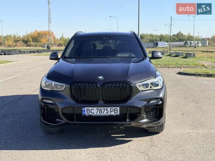 Серый БМВ Х5, объемом двигателя 3 л и пробегом 65 тыс. км за 57900 $, фото 1 на Automoto.ua