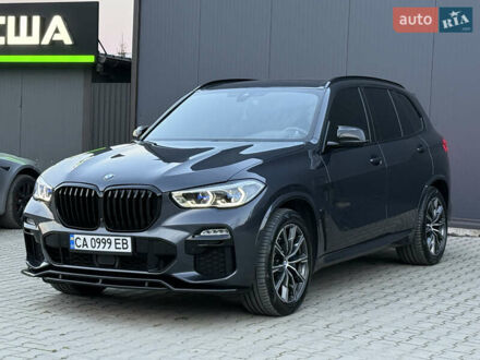 Серый БМВ Х5, объемом двигателя 3 л и пробегом 65 тыс. км за 65900 $, фото 1 на Automoto.ua