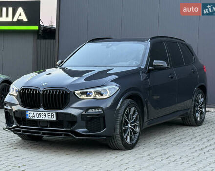 Серый БМВ Х5, объемом двигателя 3 л и пробегом 65 тыс. км за 65900 $, фото 1 на Automoto.ua