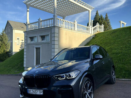 Серый БМВ Х5, объемом двигателя 3 л и пробегом 77 тыс. км за 63500 $, фото 1 на Automoto.ua