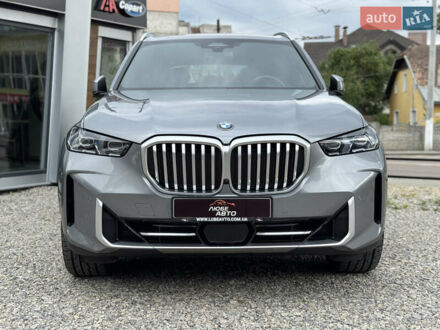 Серый БМВ Х5, объемом двигателя 3 л и пробегом 52 тыс. км за 75000 $, фото 1 на Automoto.ua