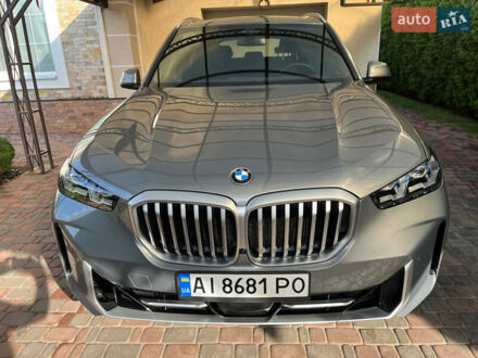 Серый БМВ Х5, объемом двигателя 3 л и пробегом 42 тыс. км за 80800 $, фото 1 на Automoto.ua