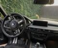 Синій БМВ Х5, об'ємом двигуна 2 л та пробігом 140 тис. км за 28152 $, фото 2 на Automoto.ua