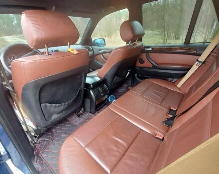 Синий БМВ Х5, объемом двигателя 3 л и пробегом 370 тыс. км за 7600 $, фото 5 на Automoto.ua