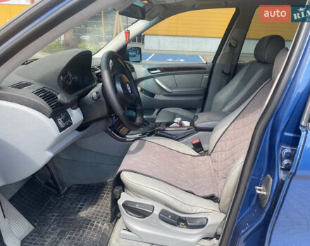 Синий БМВ Х5, объемом двигателя 3 л и пробегом 305 тыс. км за 9000 $, фото 6 на Automoto.ua