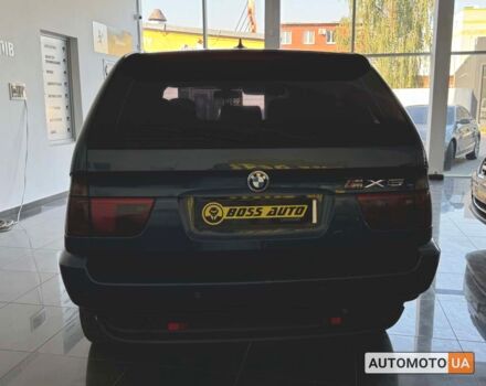 Синий БМВ Х5, объемом двигателя 3 л и пробегом 300 тыс. км за 8500 $, фото 5 на Automoto.ua