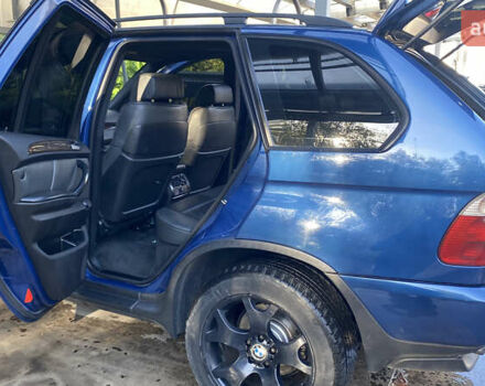 Синій БМВ Х5, об'ємом двигуна 4.4 л та пробігом 259 тис. км за 10000 $, фото 23 на Automoto.ua