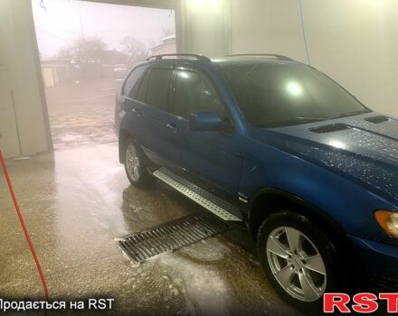 Синий БМВ Х5, объемом двигателя 3 л и пробегом 368 тыс. км за 10500 $, фото 3 на Automoto.ua