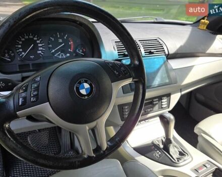 Синій БМВ Х5, об'ємом двигуна 3 л та пробігом 371 тис. км за 8500 $, фото 41 на Automoto.ua