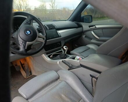 Синий БМВ Х5, объемом двигателя 3 л и пробегом 380 тыс. км за 6700 $, фото 7 на Automoto.ua