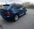 Синий БМВ Х5, объемом двигателя 3 л и пробегом 380 тыс. км за 6700 $, фото 3 на Automoto.ua
