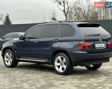 Синий БМВ Х5, объемом двигателя 3 л и пробегом 343 тыс. км за 9399 $, фото 4 на Automoto.ua