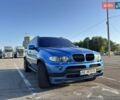 Синий БМВ Х5, объемом двигателя 4.8 л и пробегом 290 тыс. км за 12500 $, фото 1 на Automoto.ua