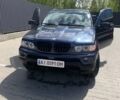 Синий БМВ Х5, объемом двигателя 2.98 л и пробегом 312 тыс. км за 10000 $, фото 1 на Automoto.ua