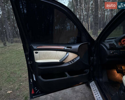 Синий БМВ Х5, объемом двигателя 3 л и пробегом 333 тыс. км за 9700 $, фото 26 на Automoto.ua
