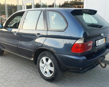 Синий БМВ Х5, объемом двигателя 3 л и пробегом 280 тыс. км за 5200 $, фото 1 на Automoto.ua