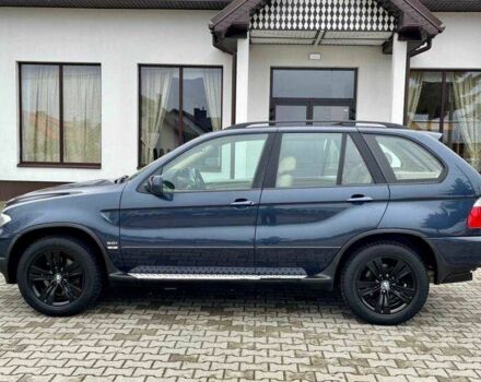 Синій БМВ Х5, об'ємом двигуна 3 л та пробігом 275 тис. км за 3023 $, фото 3 на Automoto.ua