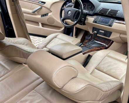 Синій БМВ Х5, об'ємом двигуна 3 л та пробігом 275 тис. км за 3023 $, фото 4 на Automoto.ua