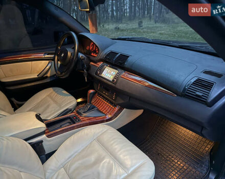 Синий БМВ Х5, объемом двигателя 3 л и пробегом 333 тыс. км за 9700 $, фото 15 на Automoto.ua