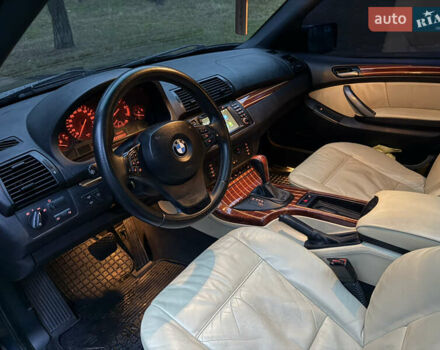 Синий БМВ Х5, объемом двигателя 3 л и пробегом 333 тыс. км за 9700 $, фото 24 на Automoto.ua