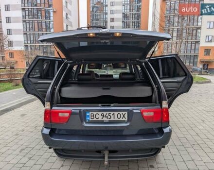 Синій БМВ Х5, об'ємом двигуна 3 л та пробігом 362 тис. км за 12700 $, фото 74 на Automoto.ua