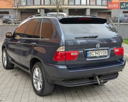 Синій БМВ Х5, об'ємом двигуна 3 л та пробігом 362 тис. км за 12700 $, фото 29 на Automoto.ua