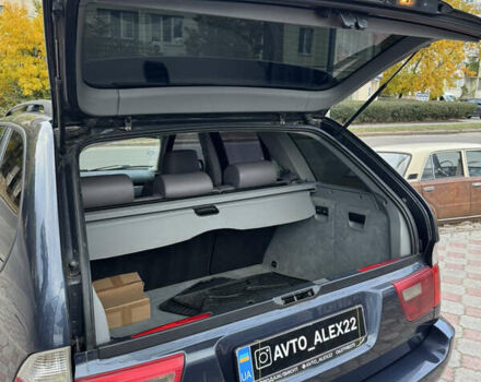 Синій БМВ Х5, об'ємом двигуна 3 л та пробігом 340 тис. км за 6299 $, фото 22 на Automoto.ua