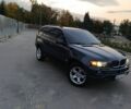 Синий БМВ Х5, объемом двигателя 3 л и пробегом 300 тыс. км за 5400 $, фото 2 на Automoto.ua