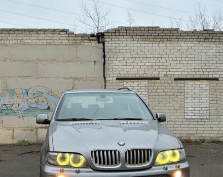 Синий БМВ Х5, объемом двигателя 3 л и пробегом 300 тыс. км за 6200 $, фото 1 на Automoto.ua