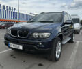 Синий БМВ Х5, объемом двигателя 3 л и пробегом 318 тыс. км за 13999 $, фото 1 на Automoto.ua
