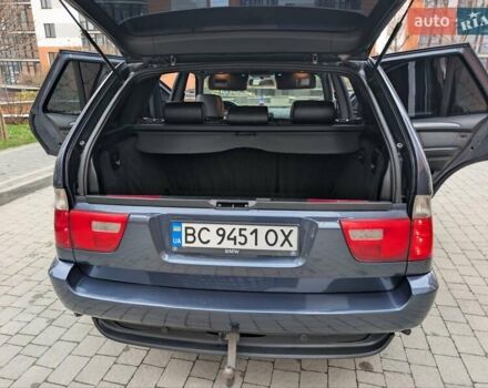 Синій БМВ Х5, об'ємом двигуна 3 л та пробігом 362 тис. км за 12700 $, фото 75 на Automoto.ua