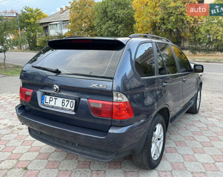Синій БМВ Х5, об'ємом двигуна 3 л та пробігом 340 тис. км за 6299 $, фото 4 на Automoto.ua