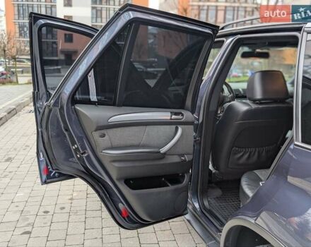 Синій БМВ Х5, об'ємом двигуна 3 л та пробігом 362 тис. км за 12700 $, фото 49 на Automoto.ua