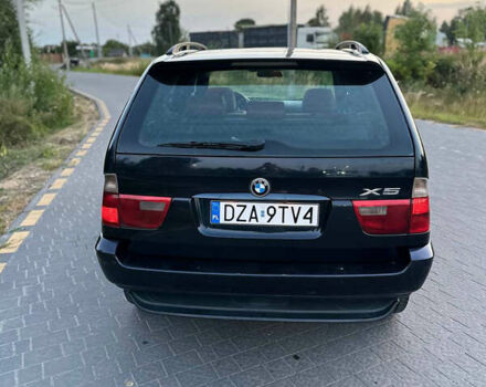Синий БМВ Х5, объемом двигателя 3 л и пробегом 350 тыс. км за 7650 $, фото 4 на Automoto.ua