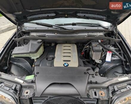 Синій БМВ Х5, об'ємом двигуна 3 л та пробігом 362 тис. км за 12700 $, фото 23 на Automoto.ua
