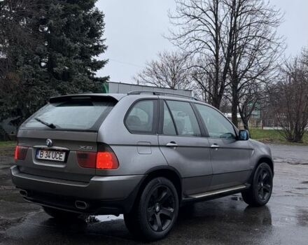 Синий БМВ Х5, объемом двигателя 3 л и пробегом 300 тыс. км за 6200 $, фото 4 на Automoto.ua