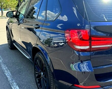 Синий БМВ Х5, объемом двигателя 3 л и пробегом 135 тыс. км за 21000 $, фото 1 на Automoto.ua