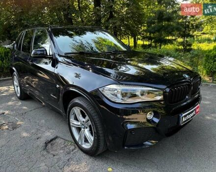 Синій БМВ Х5, об'ємом двигуна 3 л та пробігом 222 тис. км за 30990 $, фото 2 на Automoto.ua