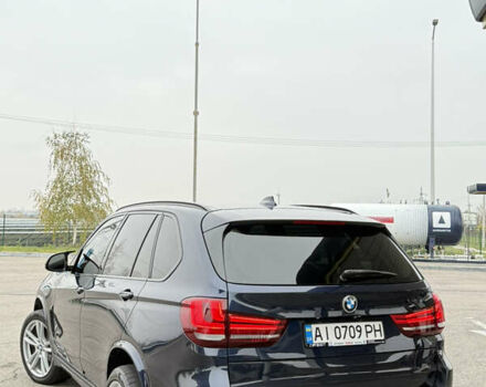 Синий БМВ Х5, объемом двигателя 3 л и пробегом 215 тыс. км за 21000 $, фото 4 на Automoto.ua