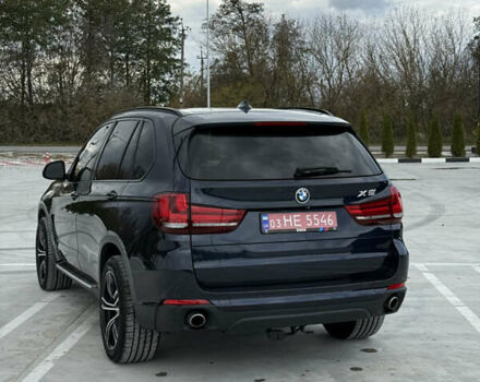 Синий БМВ Х5, объемом двигателя 3 л и пробегом 250 тыс. км за 24900 $, фото 4 на Automoto.ua